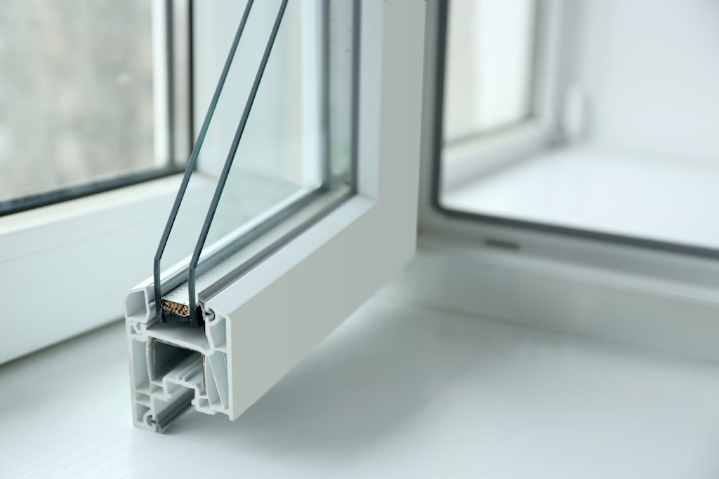 Sample of window profile on windowsill, closeup